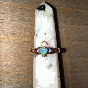 rose goldtone claddagh ring with blue cz stone heart sz 7